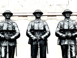 guards memorial statues of soldiers